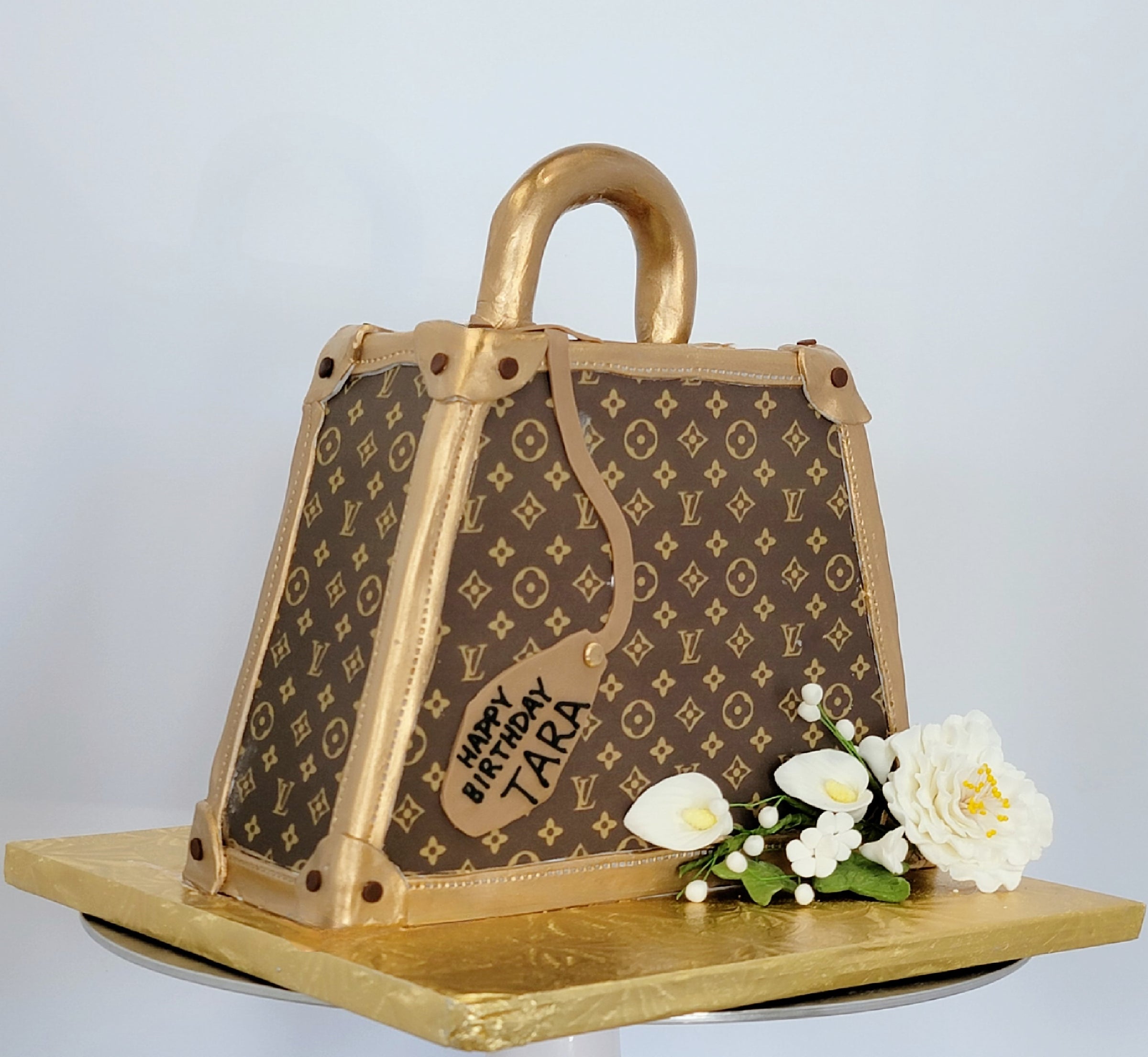 Louis Vuitton Briefcase shaped cake in brown & gold